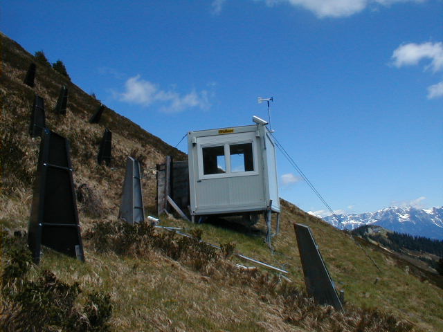 Instrumentation shelter, protected from snow glide and with anemometer and web cam on the roof